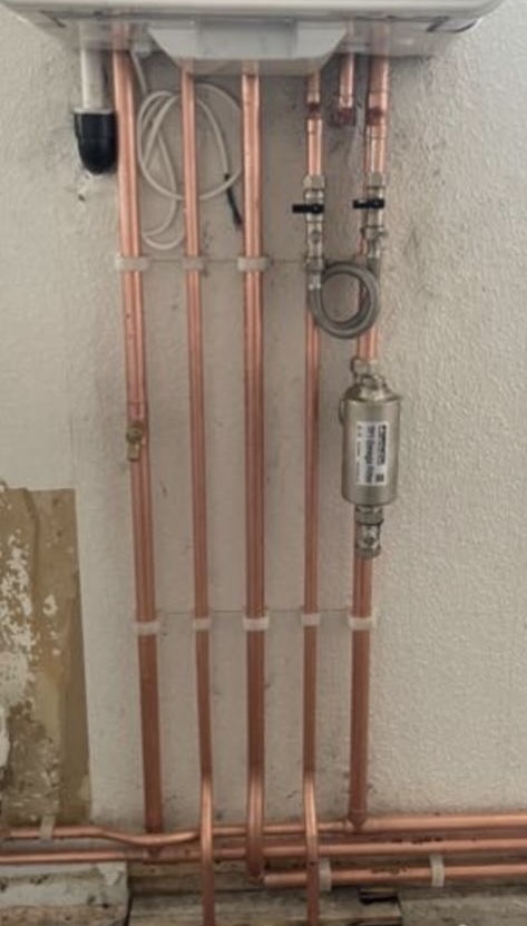 Modern domestic boiler installation in a Liverpool property