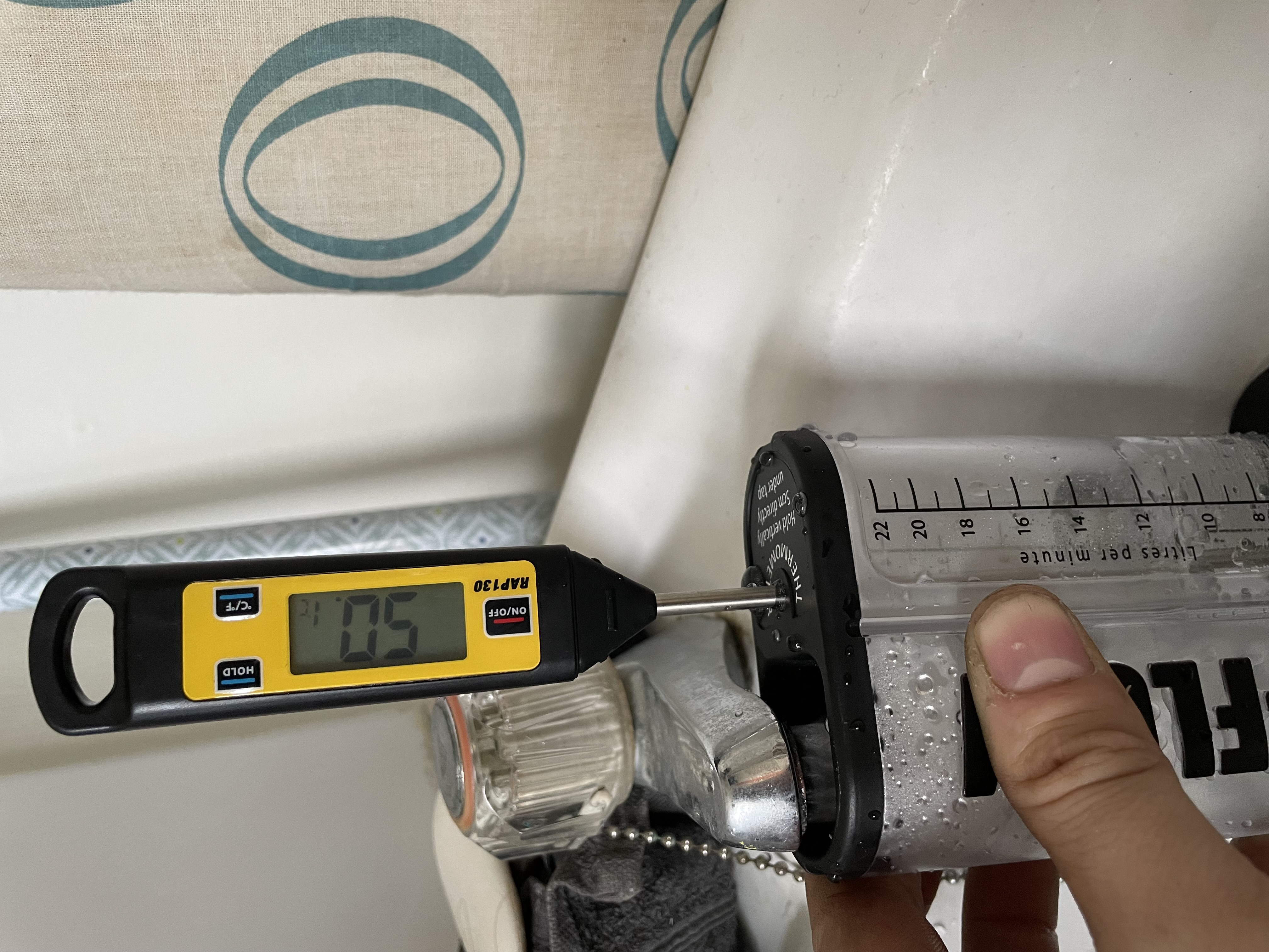 Hot water temperature testing carried out during system checks by Pomona Eco Solutions