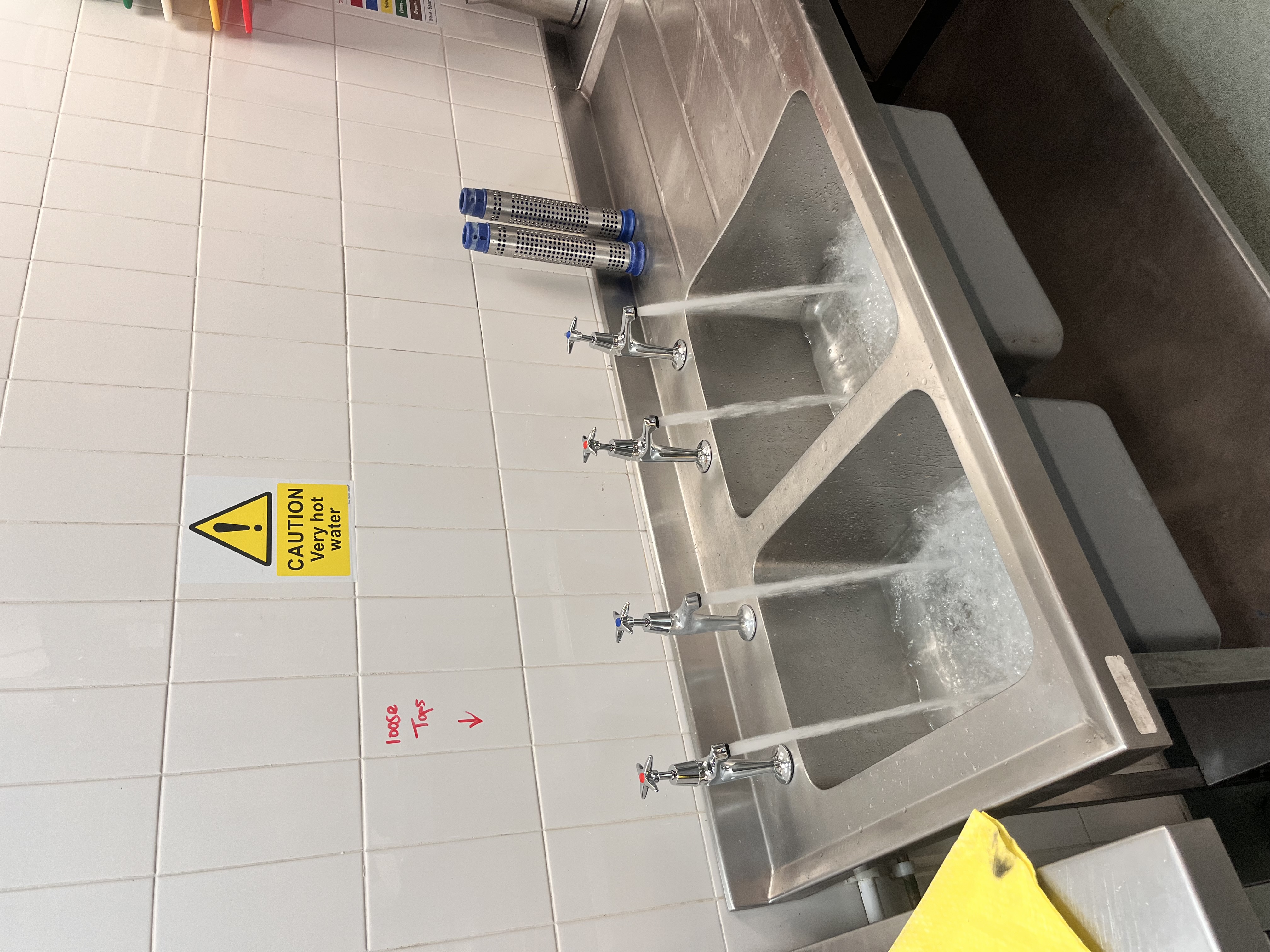 Stainless steel sink installation and water flow test by Pomona Eco Solutions