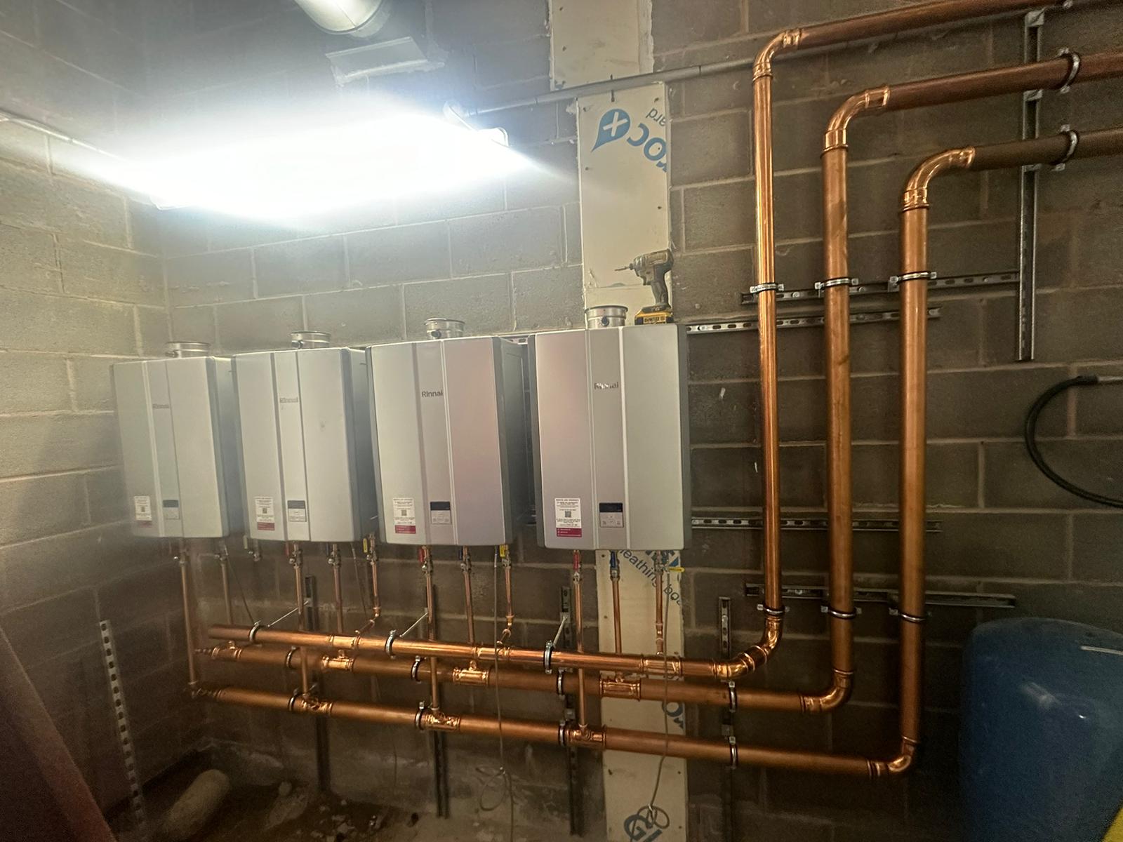 Neat copper pipework and boiler installation by Pomona Eco Solutions heating engineers in Liverpool